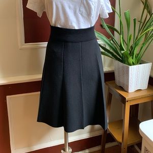 Black pleated sweater skirt